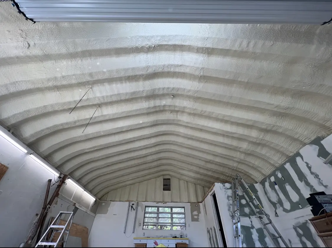 Spray polyurethane foam applied to the underside of a metal roof deck in Litchfield Beach